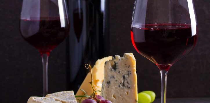 glassandbottleofwinewithcheesegrapesandnuts-2
