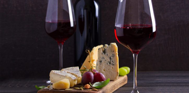glassandbottleofwinewithcheesegrapesandnuts-2-2