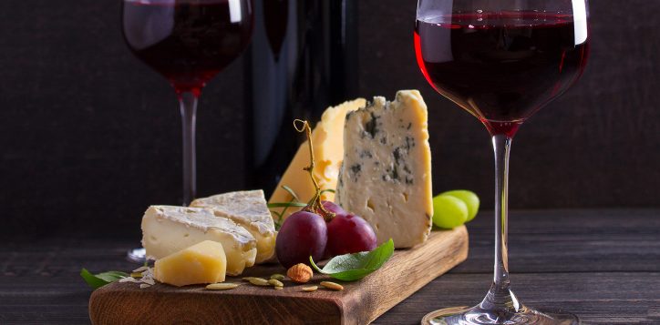 glassandbottleofwinewithcheesegrapesandnuts-4-2